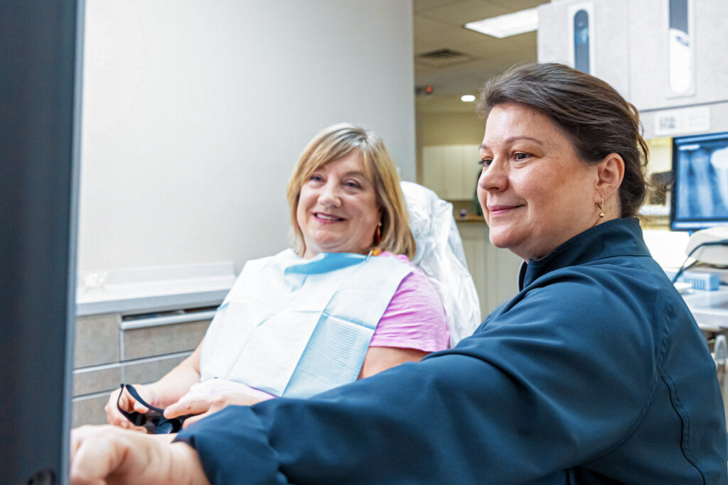A provider at Evolve Dentistry & Aesthetics walks a patient through what they should expect for their root canal in Craven County.